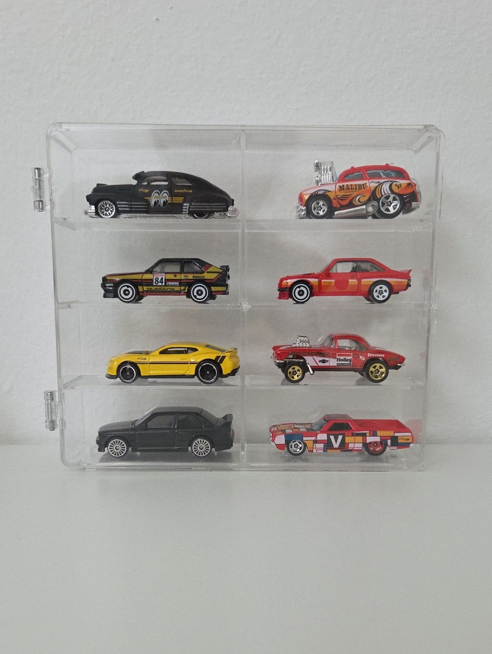 Clear 8-Slot Toy Car Display Case. Includes all of the cars inside